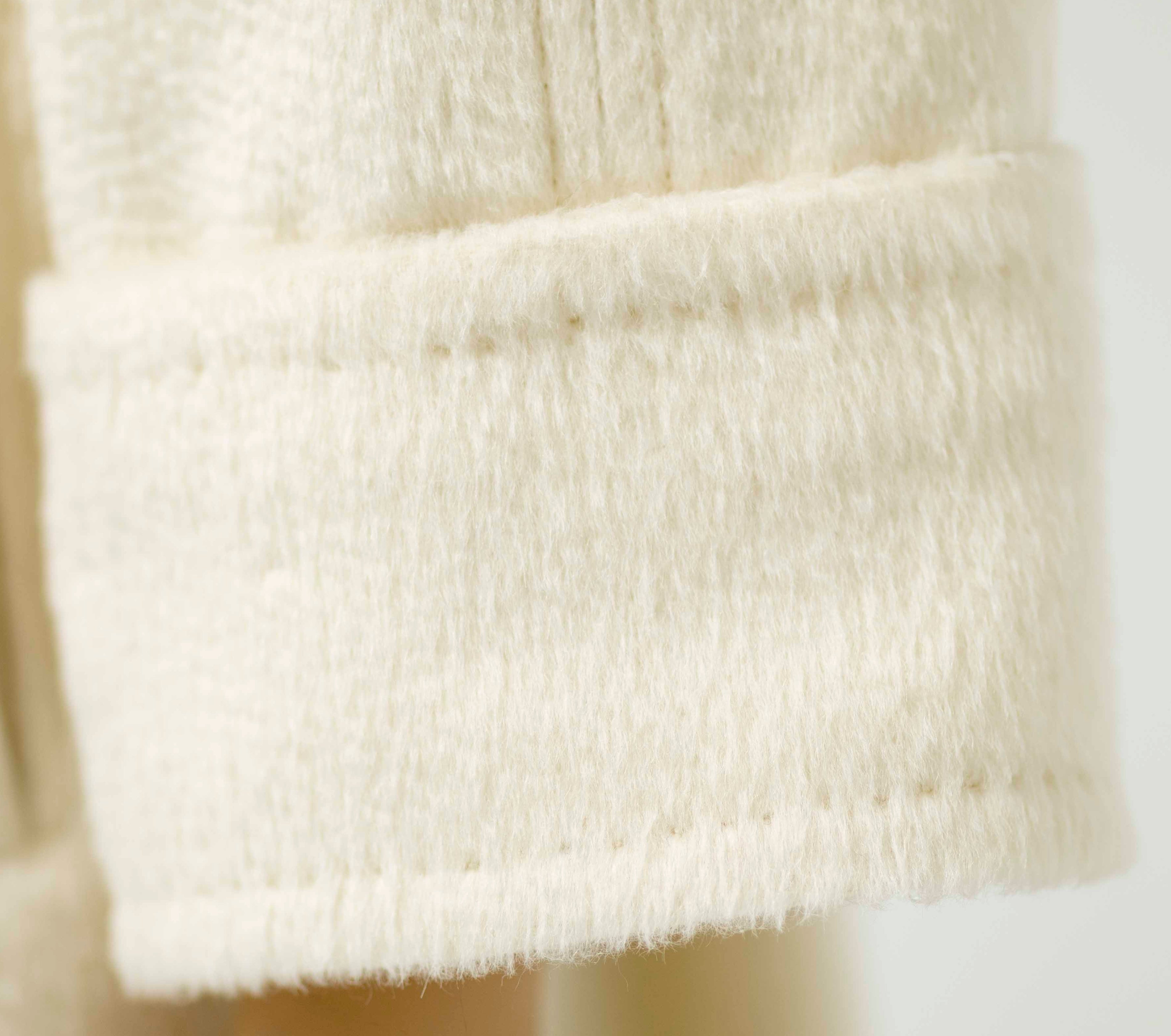 HAND-FINISHED STITCHING
