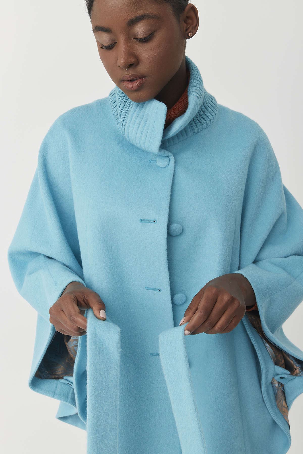 Baby alpaca cape with knitted detail | Sky-blue Amaya Cape - Image 5